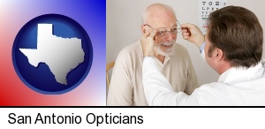 an optician fitting eyeglasses on an elderly patient in San Antonio, TX
