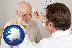 alaska map icon and an optician fitting eyeglasses on an elderly patient