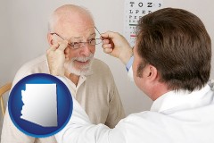 arizona map icon and an optician fitting eyeglasses on an elderly patient