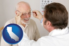california map icon and an optician fitting eyeglasses on an elderly patient