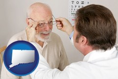 connecticut map icon and an optician fitting eyeglasses on an elderly patient