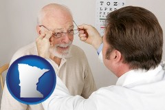 minnesota map icon and an optician fitting eyeglasses on an elderly patient