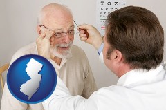 new-jersey map icon and an optician fitting eyeglasses on an elderly patient