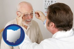 ohio map icon and an optician fitting eyeglasses on an elderly patient