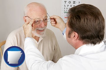 an optician fitting eyeglasses on an elderly patient - with Arkansas icon
