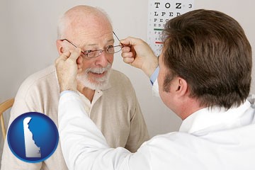 an optician fitting eyeglasses on an elderly patient - with Delaware icon