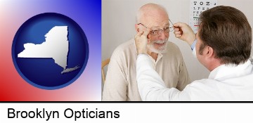 an optician fitting eyeglasses on an elderly patient in Brooklyn, NY