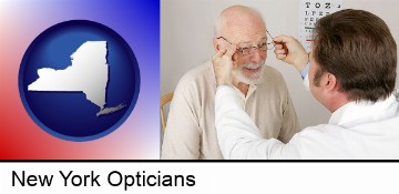 an optician fitting eyeglasses on an elderly patient in New York, NY